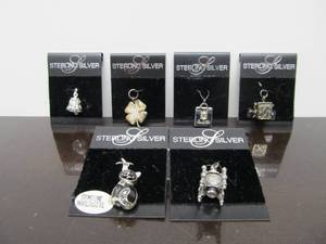 lot 176 image: Lot of 6 Sterling Silver Bracelet Charms