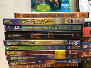 lot 254 image: LARGE Lot of Factory Sealed DVDs Classic Cartoons - Family etc