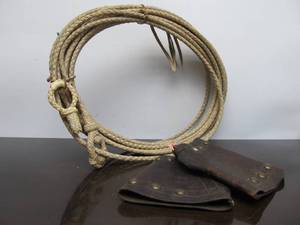 lot 193 image: Old Vintage Western Leather Cowboy Range Cuffs & Lasso
