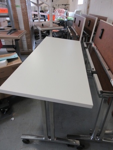 lot 125 image: HERMAN MILLER NESTING TABLES ON WHEELS