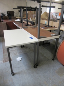lot 143 image: HERMAN MILLER, ROLLING WORK TABLES