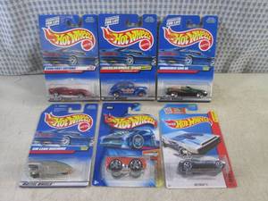 lot 131 image: (EC1) Assorted Hot Wheels in Packag...
