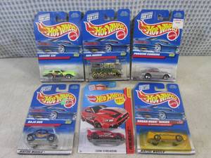 lot 133 image: (EC1) Assorted Hot Wheels in Packag...