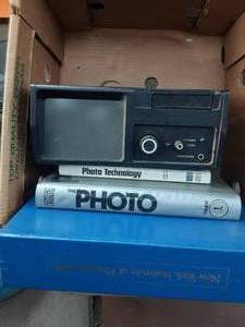 lot 91 image: Dukane Film Player & 2 Photography booksCourses