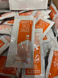 lot 82 image: Caseys Taco Sauce - 400 Count