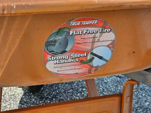 lot 134 image: Rugged Steel Wheel Barrel