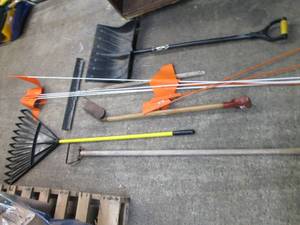 lot 64 image: Assortment of yard tools. Rake, edg...