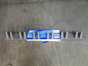 lot 71 image: Suncast 4ft wide tool hanger...