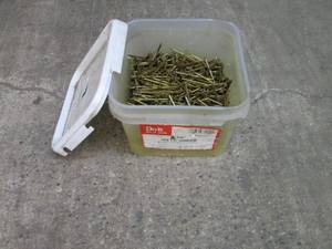 lot 75 image: Bucket of nails 16d CC sinker...
