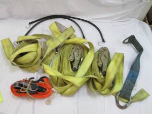lot 146 image: Tow straps and 2 bungee cords...