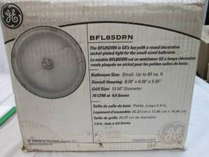 lot 148 image: GE BFL85DRN fan with a round decora...