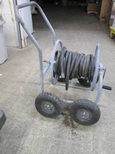 lot 170 image: Garden hose reel cart with 4 wheels...
