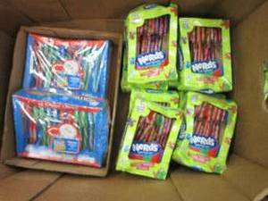 lot 235 image: 2 boxes of Jolly rancher candy cane...