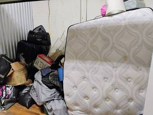 lot 3 image: 5x10 Unit - Clothes, Microwave, Misc