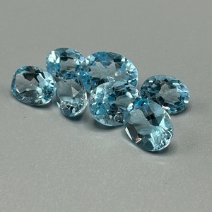 19.74 Carat Blue Topaz Oval Faceted Cut - Set of 7 Loose Stones