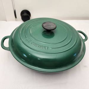lot 18 image: New Le Creuset Signature Cast Iron 3.5 Quart Brasier, GREEN. Estimated Value $368
