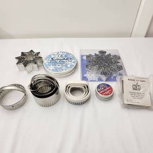 lot 38 image: Variety of Snowflake Cookie Cutters, Kolacky Tart, and Stainless Steel Fluted Biscuit Cutters