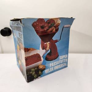 lot 53 image: Tomato Press Velox