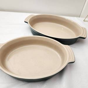 lot 83 image: Two Le Creuset Stoneware Baking Dishes in Green, Like New Condition