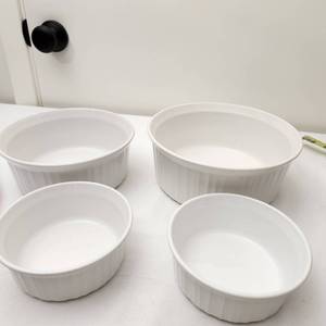 lot 89 image: Set of Four White Casserole Dishes