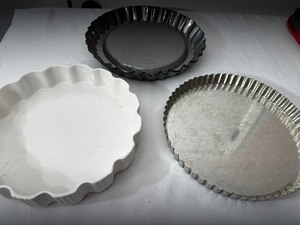 lot 92 image: Tart Pan To Duncan Heinz Dessert Pans, And A Fluted Edged Baking Dish