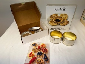 lot 99 image: Martha By Mail Mini Tart Pans Of A Variety Of Shapes, Biscuit Cutters, And English Muffin Rings