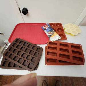 lot 103 image: Variety Of Silicone Baking DishesCandy MoldsBaby Food Freezer Molds