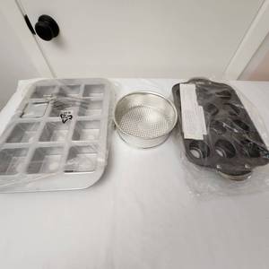 lot 107 image: Three Cheesecake Pans, One For Mini Round Cheesecakes, Mini Square And An 8 Inch Spring Foam Pan
