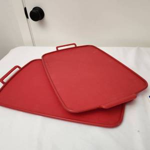 lot 123 image: Two Red Silicone Serving TraysTrivets