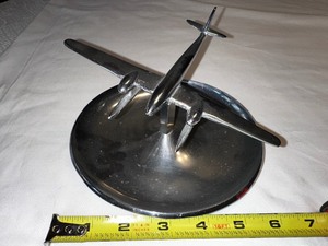 lot 194 image: Silver Plane On Swivel Round Dish 6 Diameter
