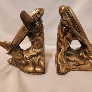 lot 233 image: Pair of Antique Aviation Metal Airplane Statue Sculpture Desk Art Book Ends Valued at $595