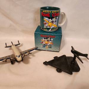 lot 242 image: TWA N4466C Vintage Model Plane, Vintage Cast Airplane Ashtray and Mickey Mouse Plane Crazy Mug