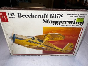 lot 361 image: Vintage AMT Beechcraft G17S Staggerwing Model Airplane Kit - New in Box
