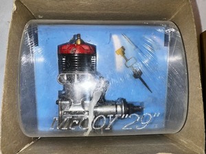 lot 371 image: Vintage McCoy 29 Series Engine New in Box