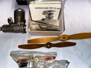 lot 373 image: Various Vintage Model Plane Propellers and Engine
