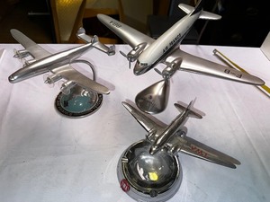 lot 377 image: Three Vintage Metal Airplanes
