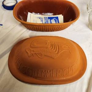 lot 316 image: Clay Oval Covered Baking Dish And Glass Pitcher