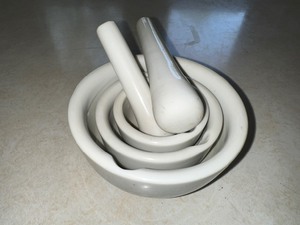 lot 405 image: Stacking Small Mortal & Pestle Set