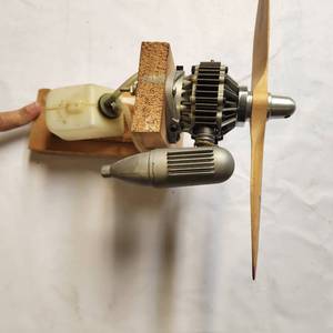 lot 381 image: Vintage Model Airplane Engine and Propeller