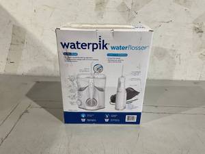lot 582 image: Waterpik Ultra Plus and Cordless Pearl Water Flosser Combo Pack