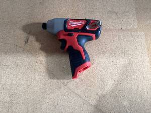 lot 436 image: Milwaukee 2462-20 M12 12-Volt Li-ion 14 Cordless Hex Impact Driver Bare Tool
