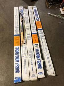 Lot of Johnson Hardware 1500 Series 24 in. to 36 in. x 80 in. Universal Pocket Door Frame for 2x4 Stud Wall    Customer Returns See Pictures