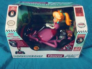 lot 136 image: New Carrera RC Mario Kart - Pipe Kart Peach