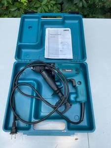 lot 7 image: Makita Hammer Drill Model HP1350
