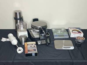 lot 73 image: Electric Waffle Maker, Electric Hand Mixer, Electric Food Processor, 2 Food Scales, ThermosInsulated Canister, Roasting Thermometer, Cookie Cutters and More