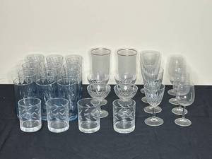 lot 86 image: Large Lot of Glassware inc. Water Glasses, 2 Frosted Goblets, Lowball Glasses and a Variety of Sized Wine Glasses