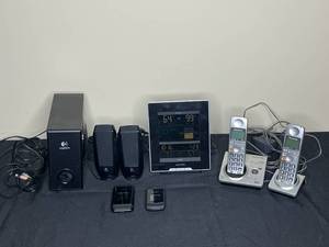 lot 96 image: Logitech Speakers, Digital Clock, Flip and Home Phones
