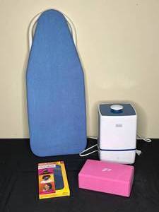 lot 112 image: Table Top Ironing Board, Black & Decker Ultrasonic Humidifier, Box of Unused Face Masks
