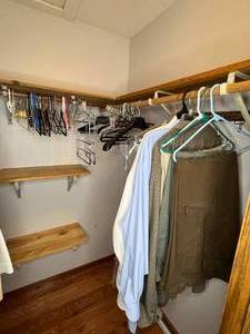 lot 115 image: Lot of Mens Clothing Inc Shirts, Pants (hangers included)