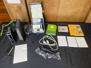 lot 179 image: Photo Paper, HDMI Cord and other Various Cords, Variety of Floppy Disks, RouterModem, etc.